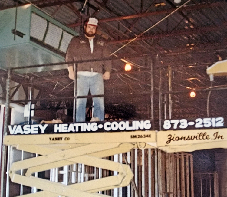 VASEY Facility Solutions - Rick Cope on a Lift